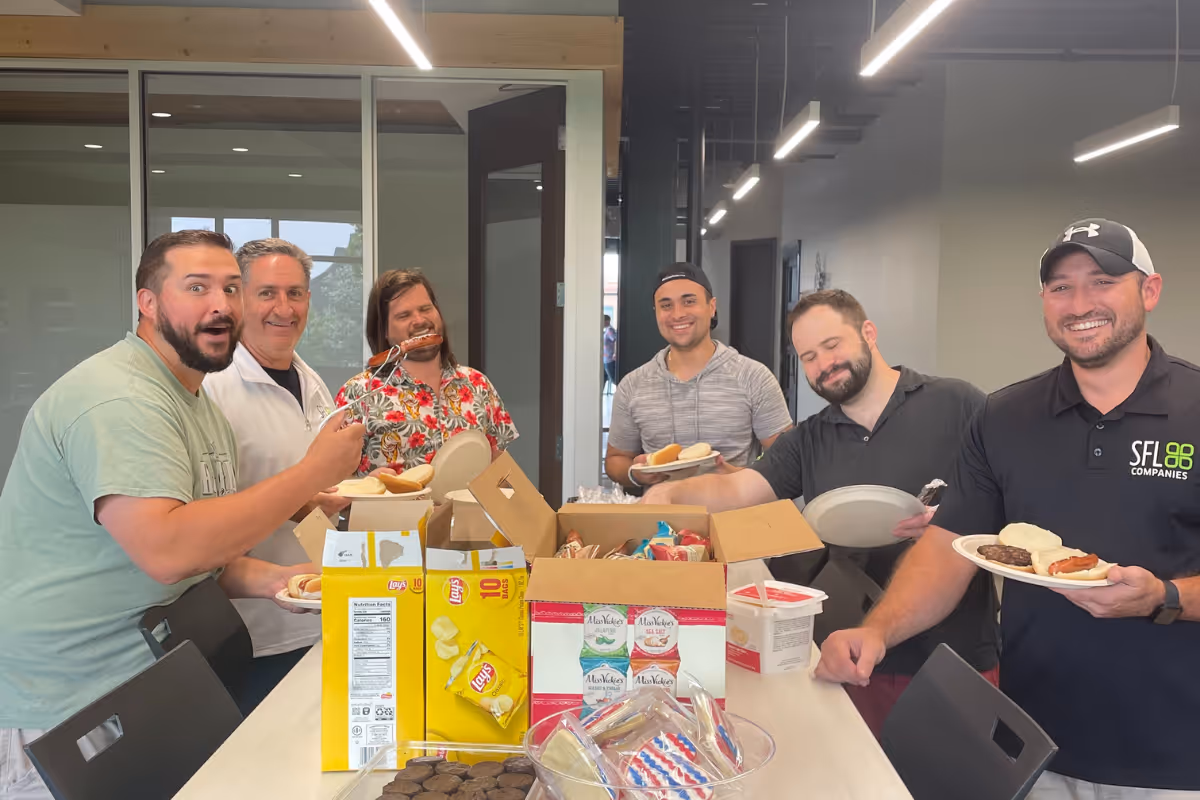 SFL Companies team enjoying lunch together with snacks and camaraderie