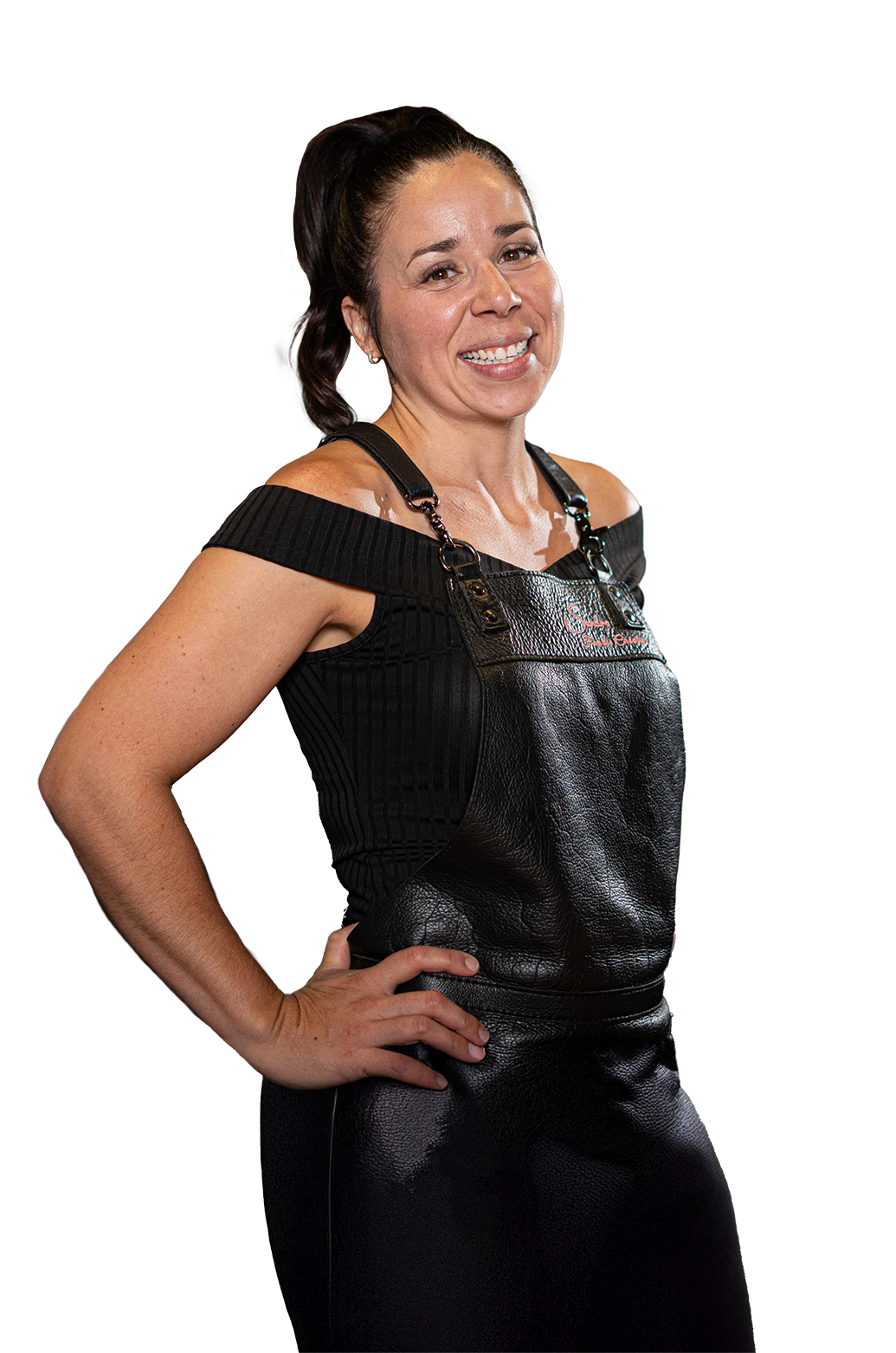 Femme souriante portant un tablier de cuisine