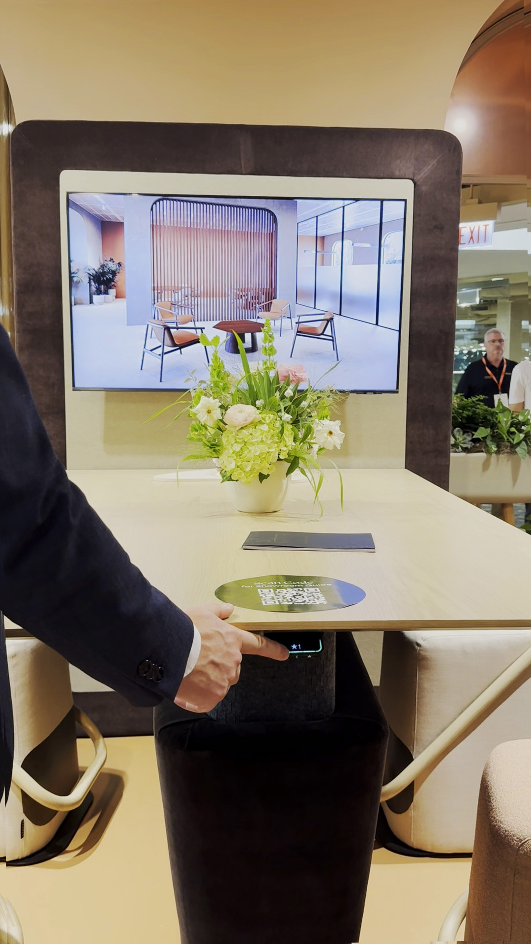 A moving conference table that converts from sitting to standing.