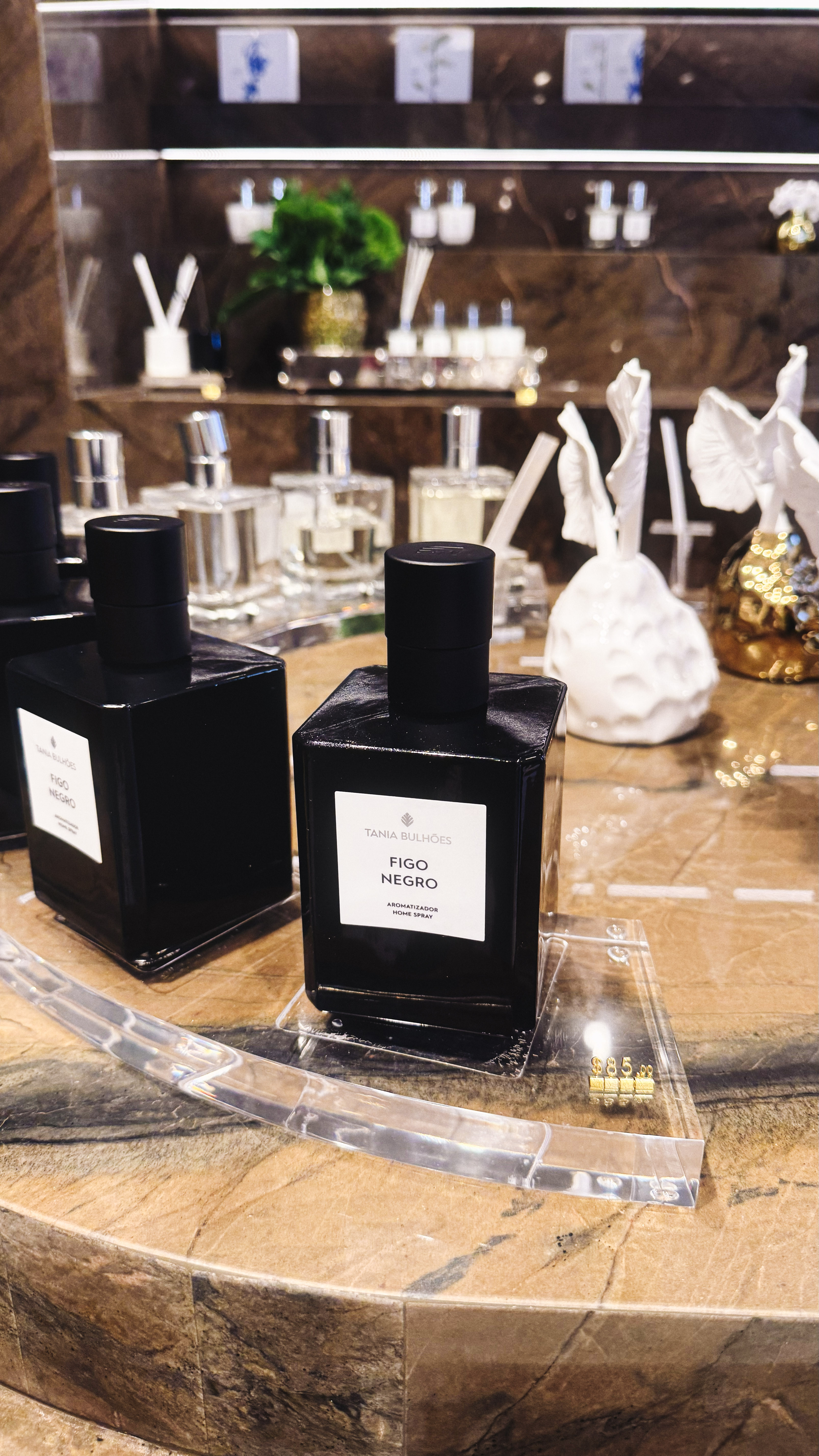 A bottle of black fig diffuser scent.