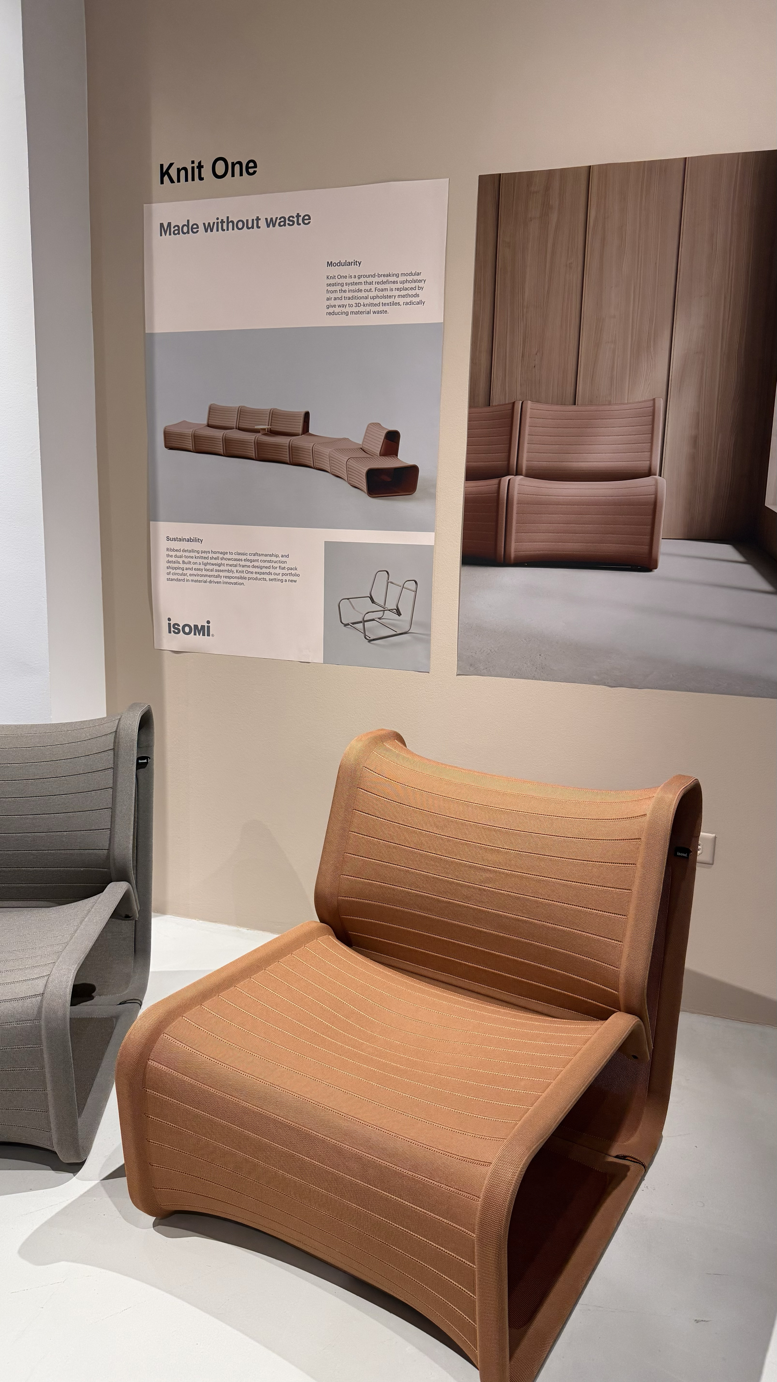 Orange chair with a ribbed textured material.