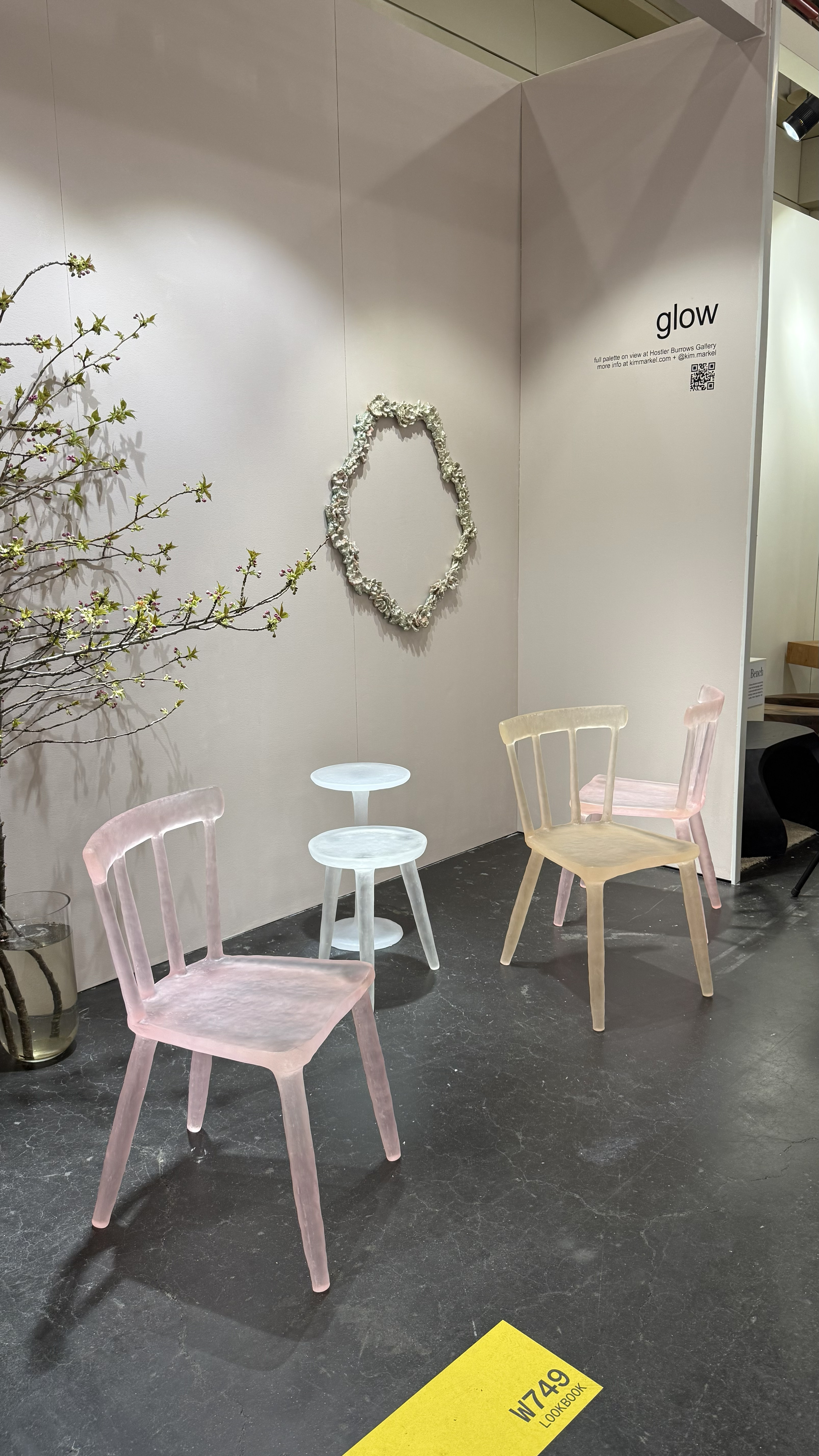 Frosted glass looking chairs in the color pink and orange.