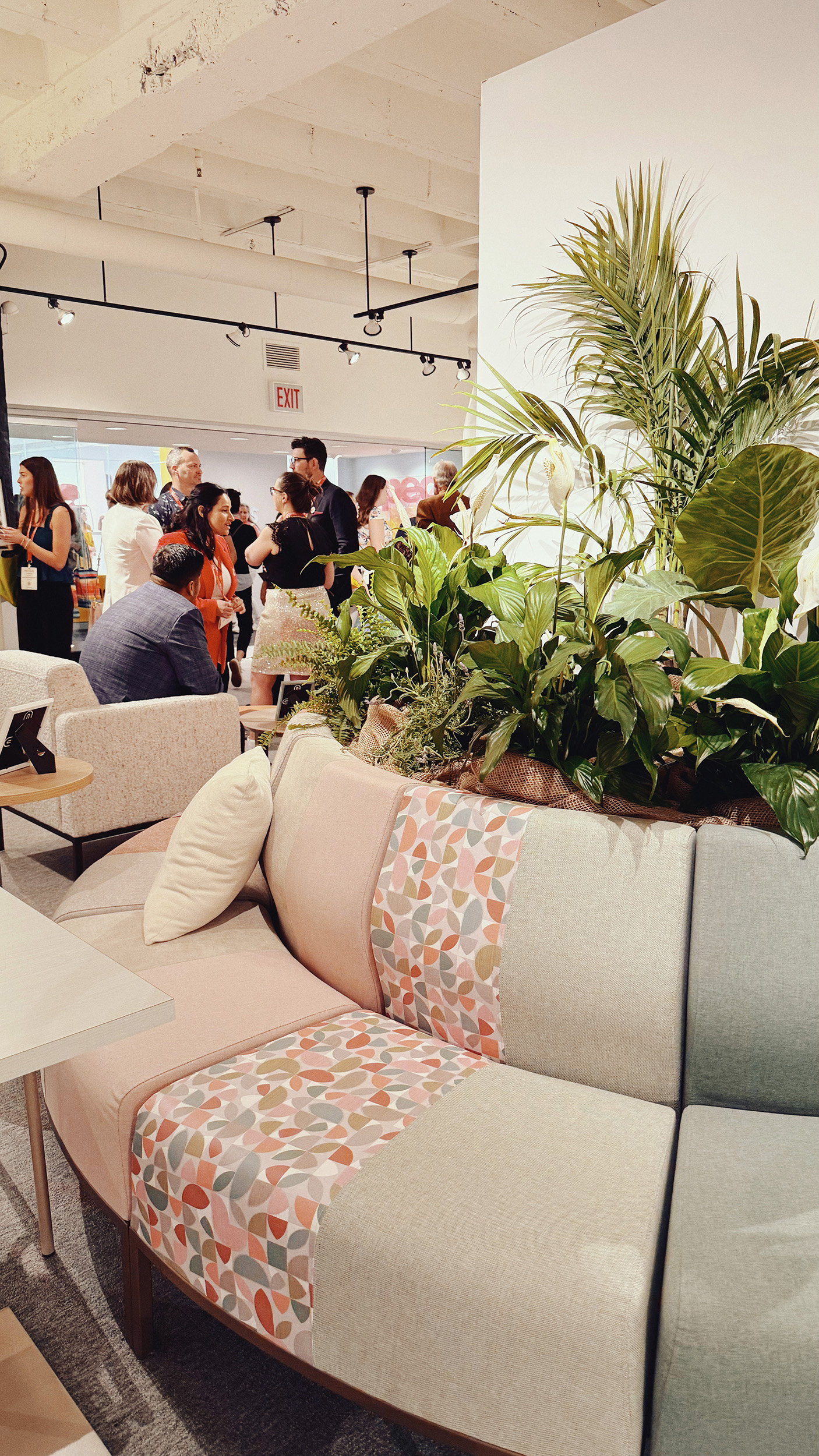 A circular, modular seating component, each seat with a different fabric or pattern.