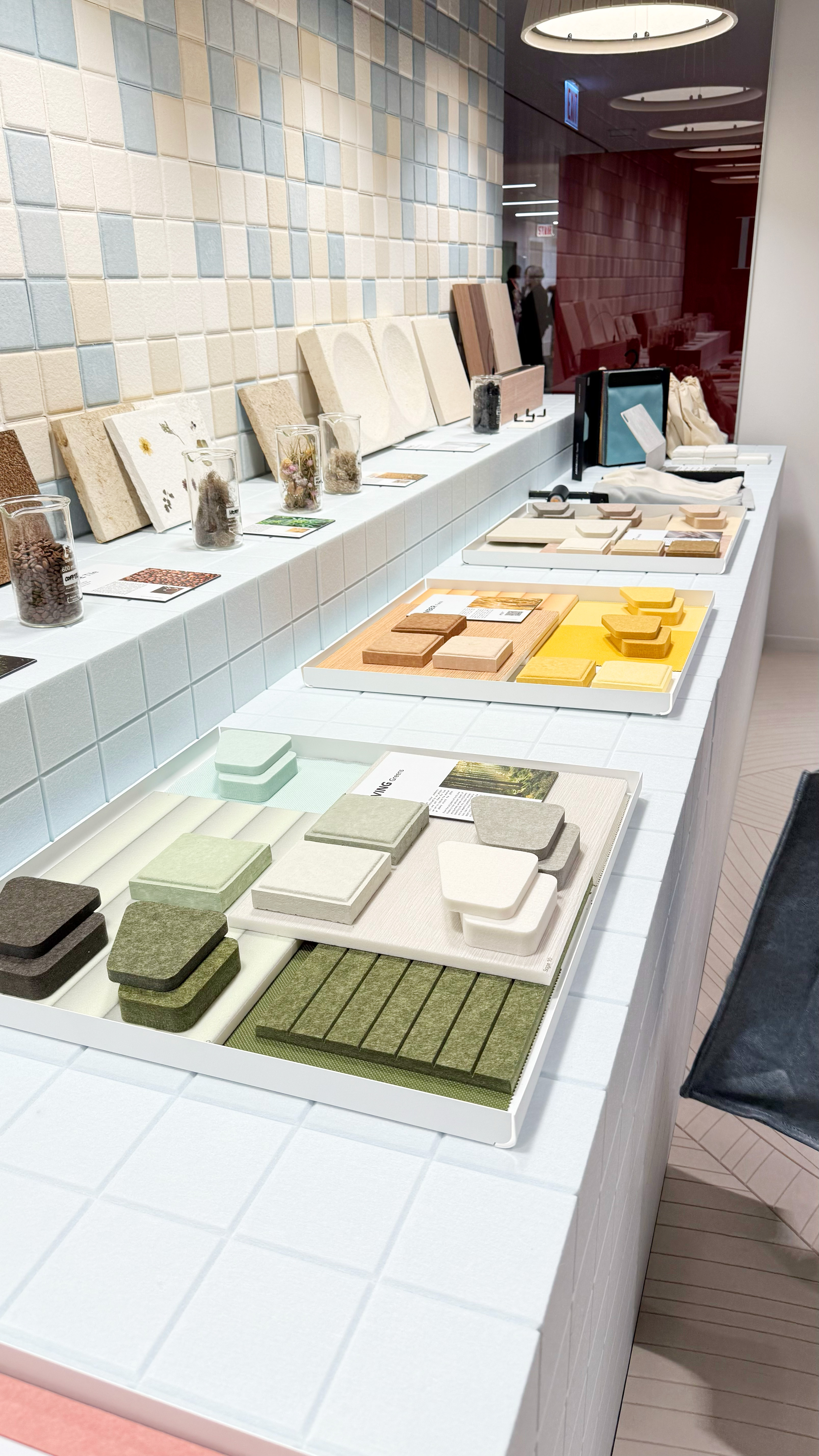 An array of cotton sound dampening tiles with different colors and textures.