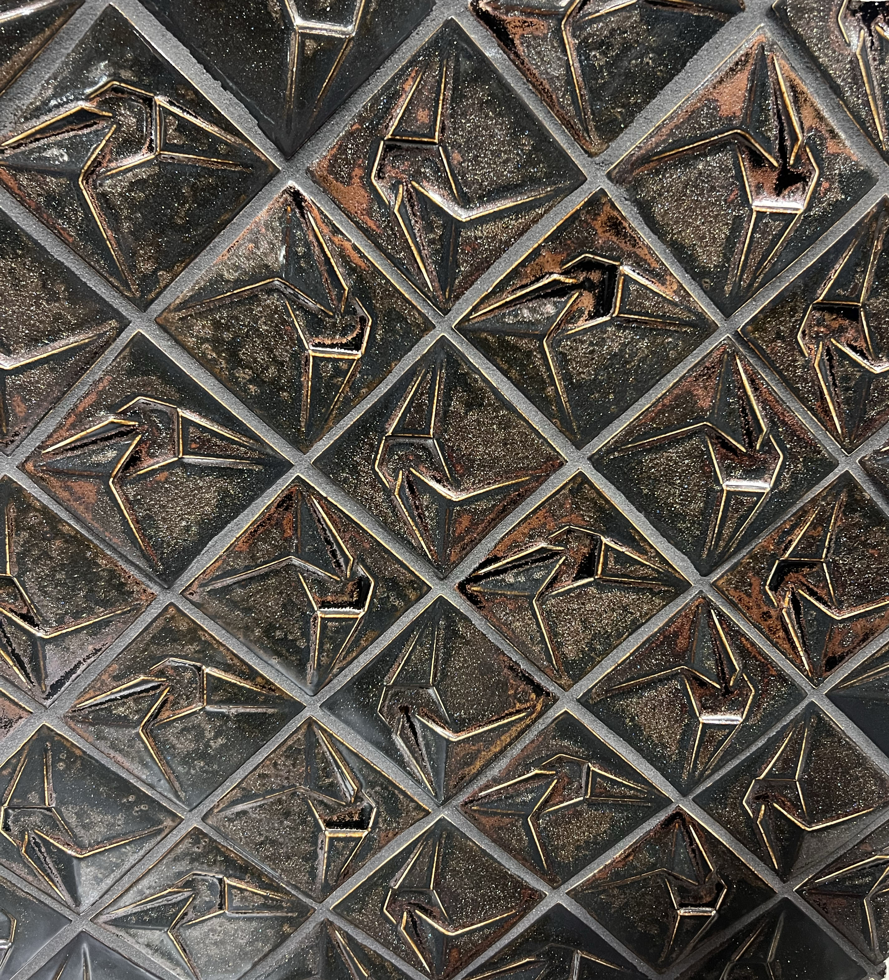 Bronze, sparkly, textured decorative tile
