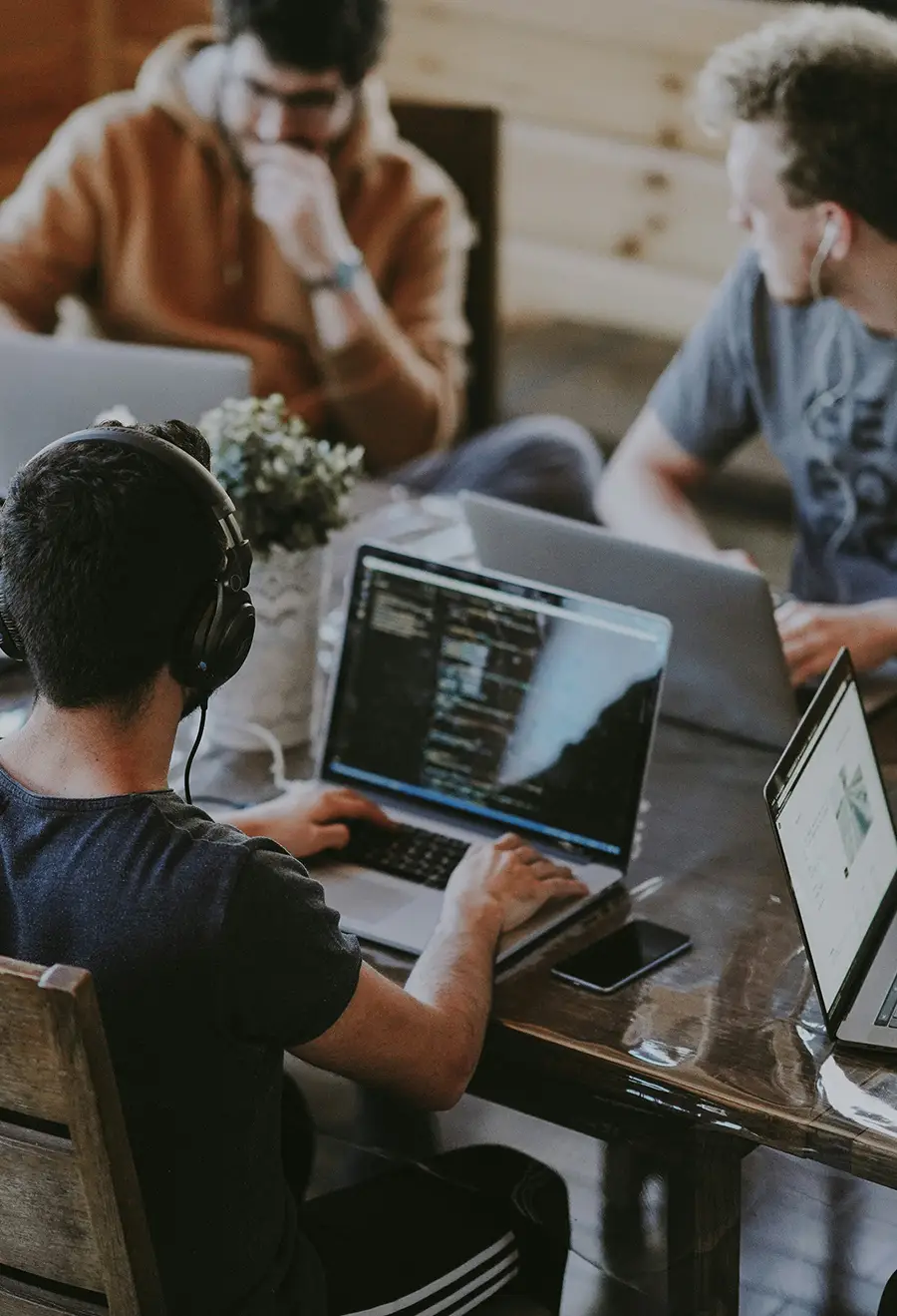 A photo of students working on laptops
