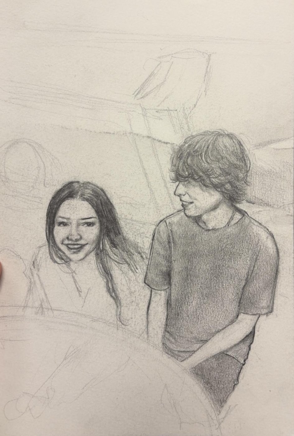 Unfinished pencil sketch of Camilla sitting beside a boy, smiling