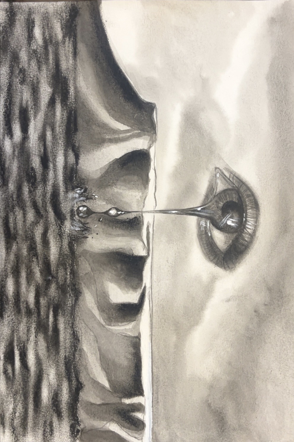 Surreal Eye: a giant eye in the sky above a cliff, shedding a tear that falls into a gray sea
