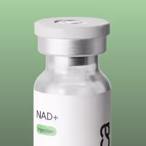 Small green and silver vial labeled NAD+.