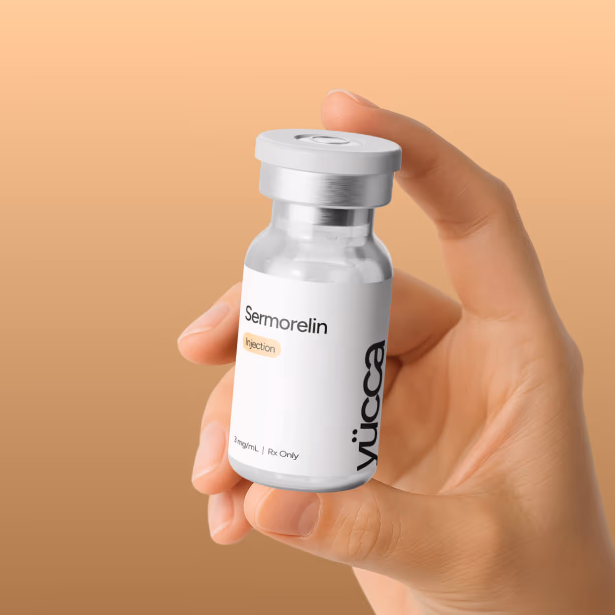 Hand holding Sermorelin peptide injection vial 3mg/mL — Yucca Health