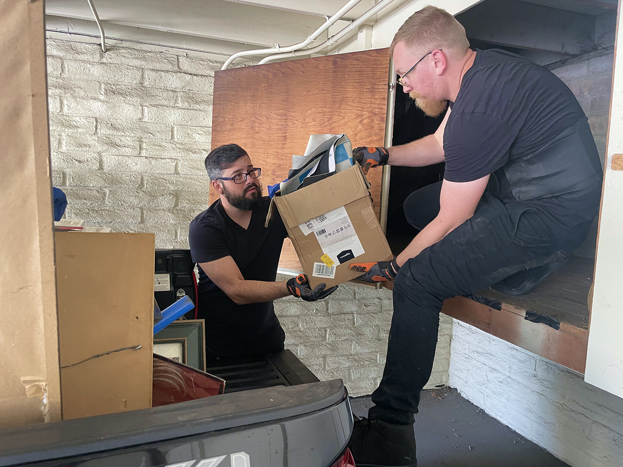 Junk removal workers in action
