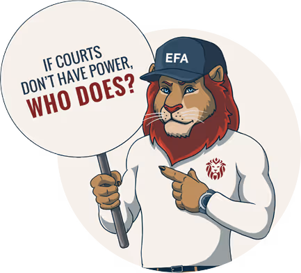 Lion mascot holding sign “If courts don’t have power, who does?” questioning accountability in the legal system