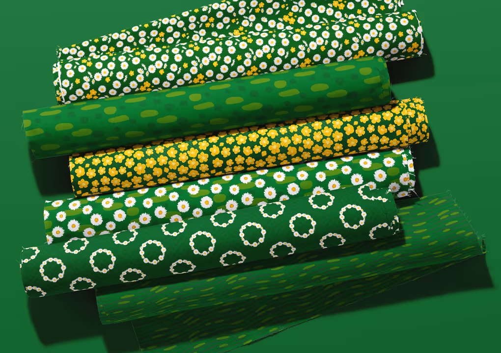 Six rolls of green fabric in the Summer Lawn pattern collection in the Fresh Meadow green colorway. Patterns have English Daisy's and yellow Buttercups, along with handrawn dots and lines.