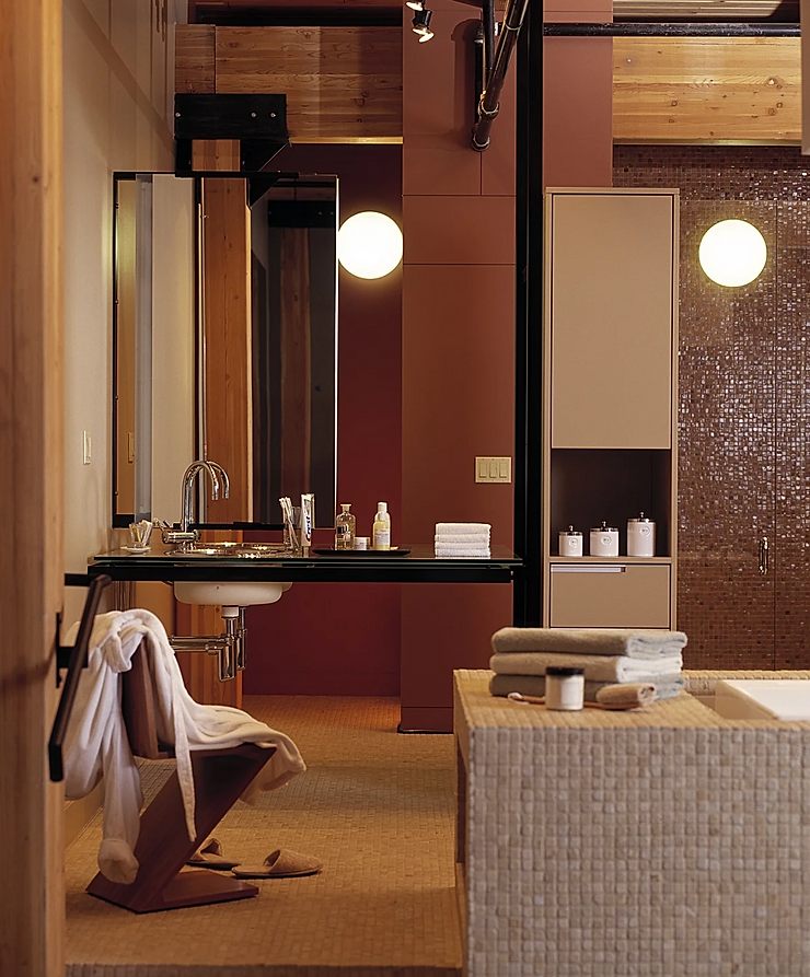 VIEW INTO THE MODERN BATHROOM AND TUB AREA