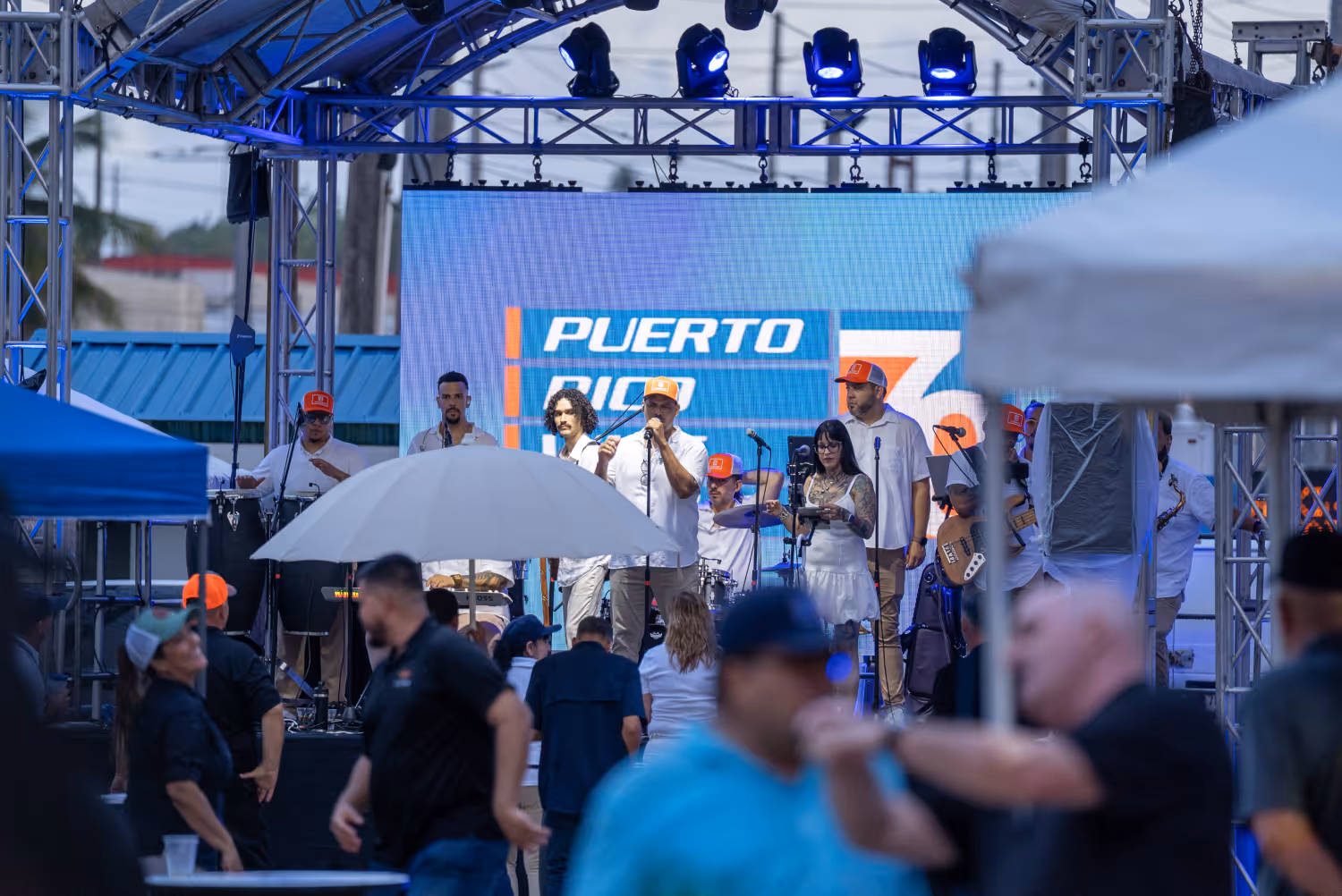 Puerto Rico Wire Group anniversary celebration in 2025 with live music event, employees, and community gathering, marking 70 years of trusted construction solutions and family leadership.