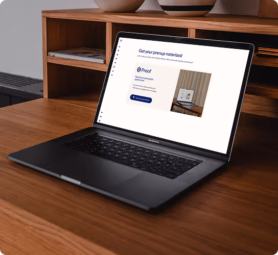 Laptop displaying a webpage about getting a premium notarized document, placed on a wooden desk with shelves in the background.