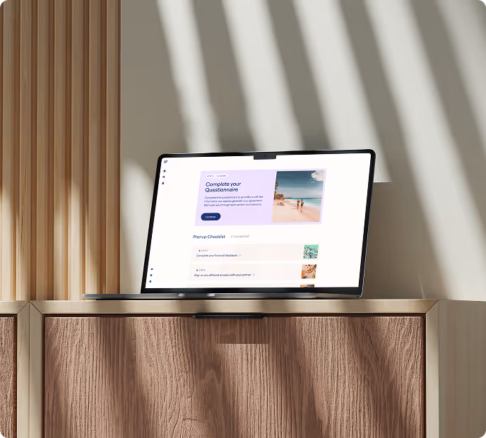 Laptop on a wooden cabinet displaying a questionnaire webpage with a beach image and checklist.