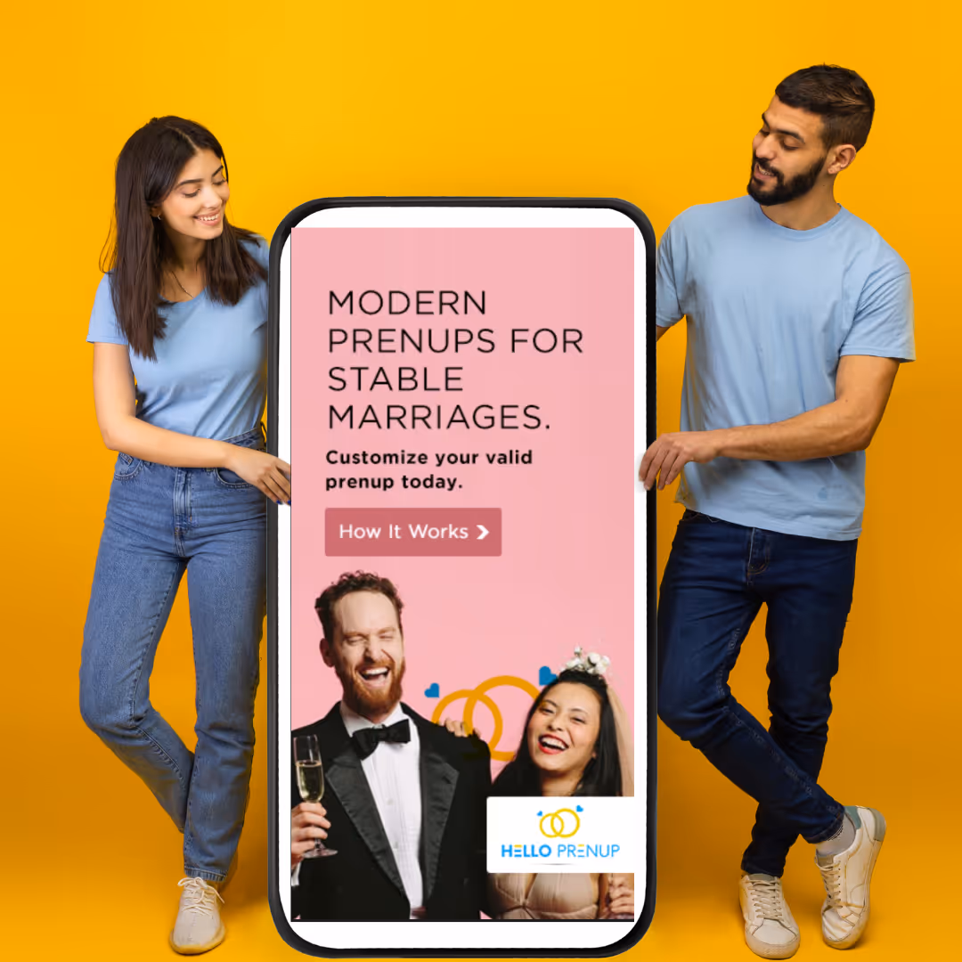 A woman and a man wearing light blue shirts hold a large phone screen showing an ad for Hello Prenup offering modern prenups for stable marriages with a smiling bride and groom.
