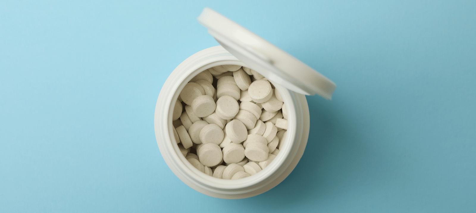 medicine bottle with pills