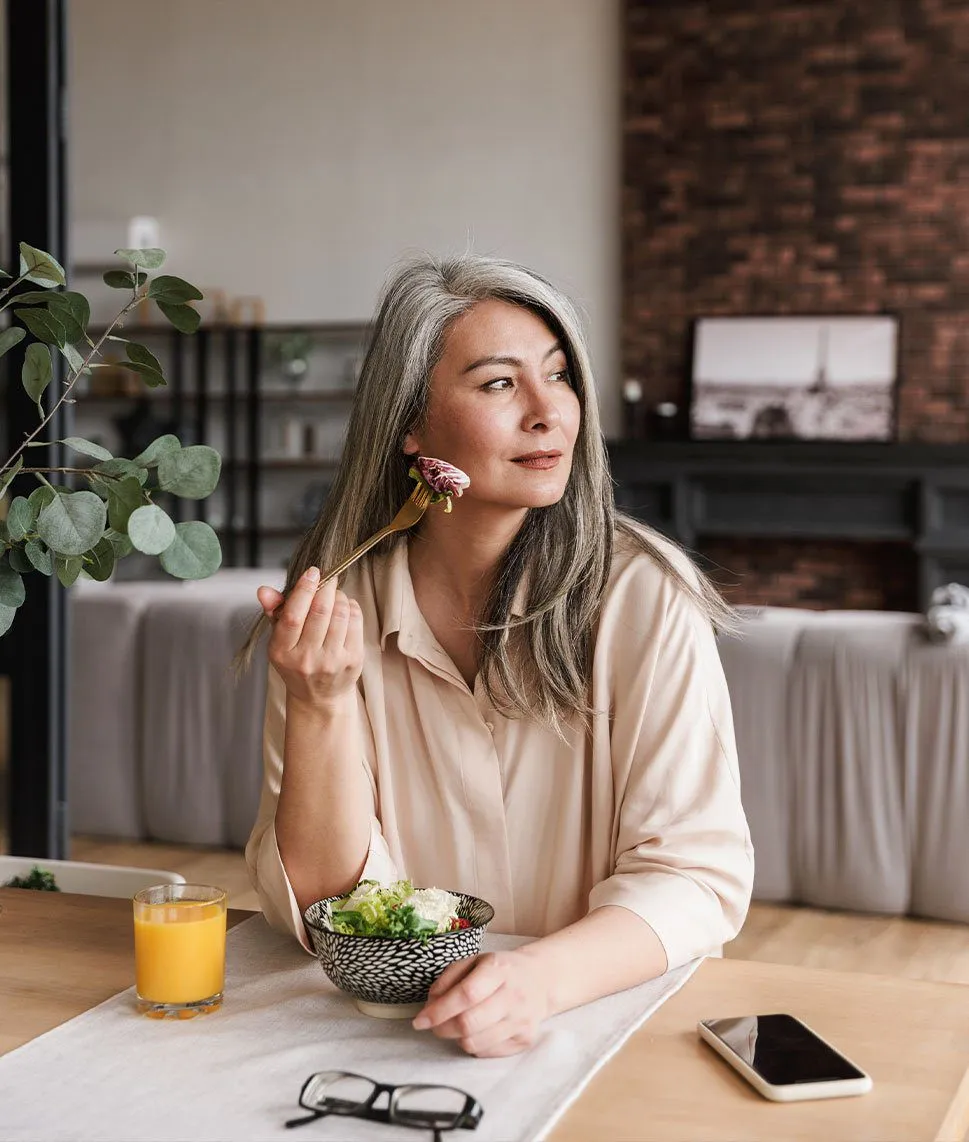 Woman eating a healthy meal.