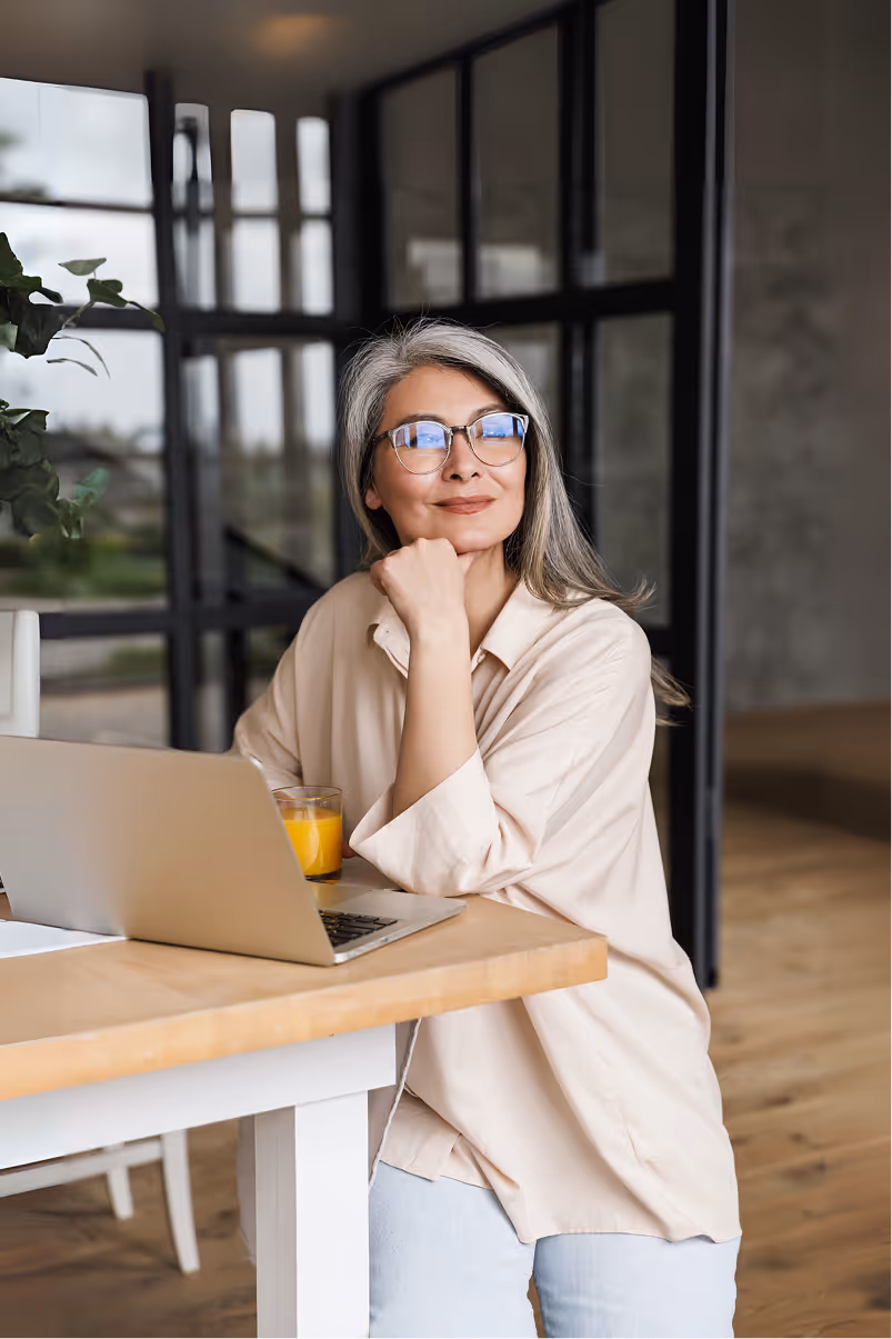 Woman taking a break from working on the computer