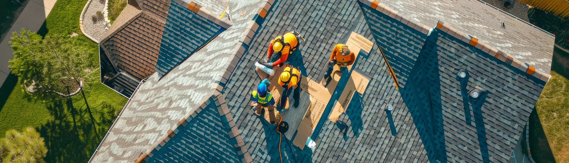 men working on roof