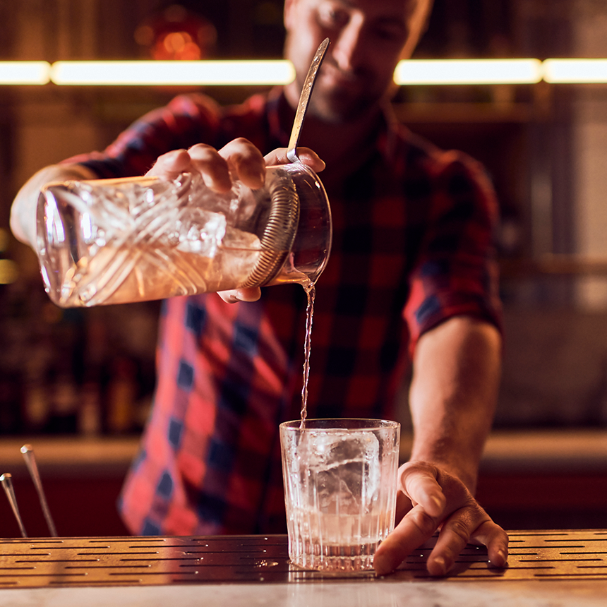 Bartender serving a cocktail