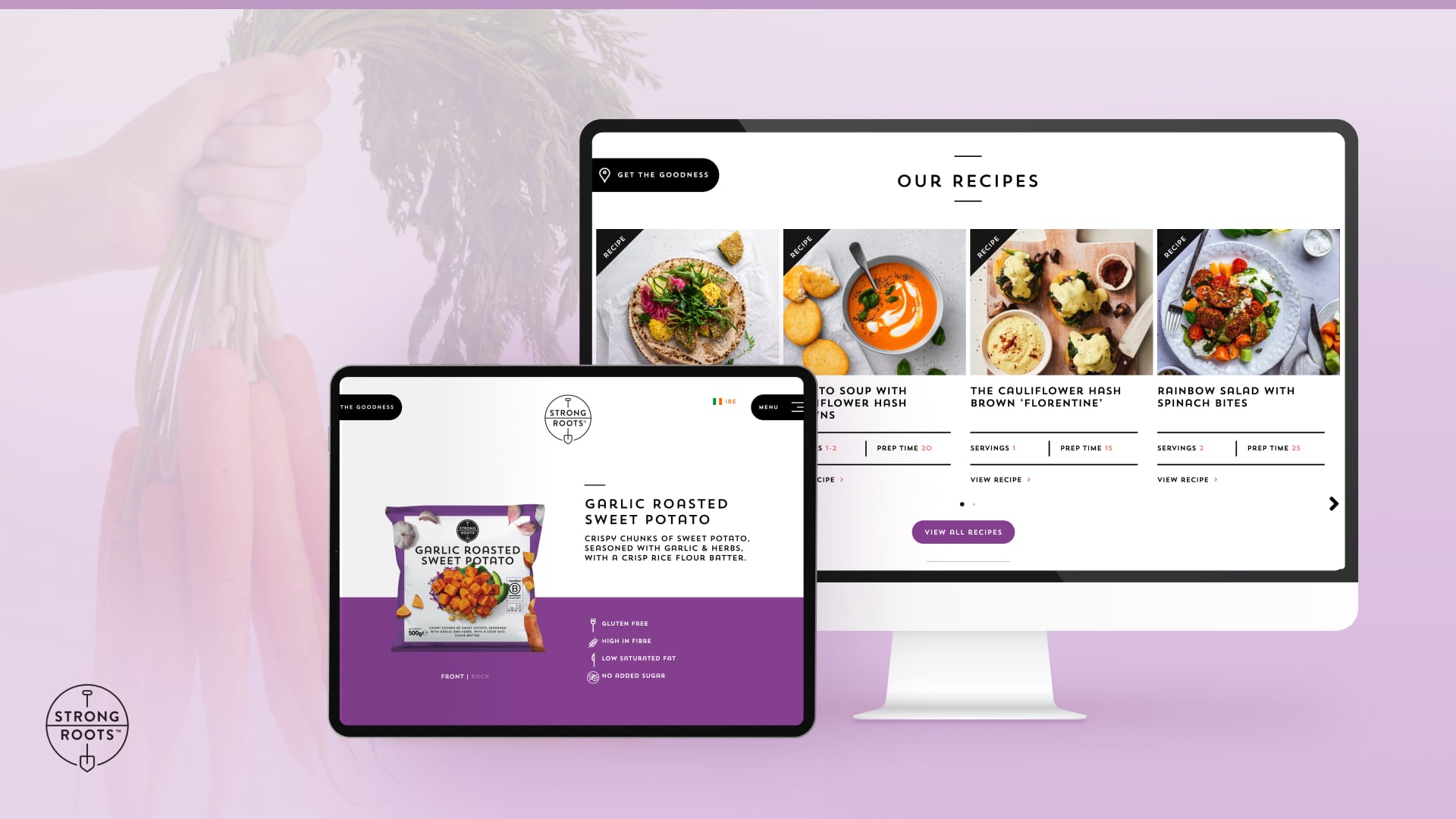 Digital devices showing Strong Roots product Garlic Roasted Sweet Potato and a recipe webpage with various vegetable dishes on a purple background with a hand holding fresh carrots.
