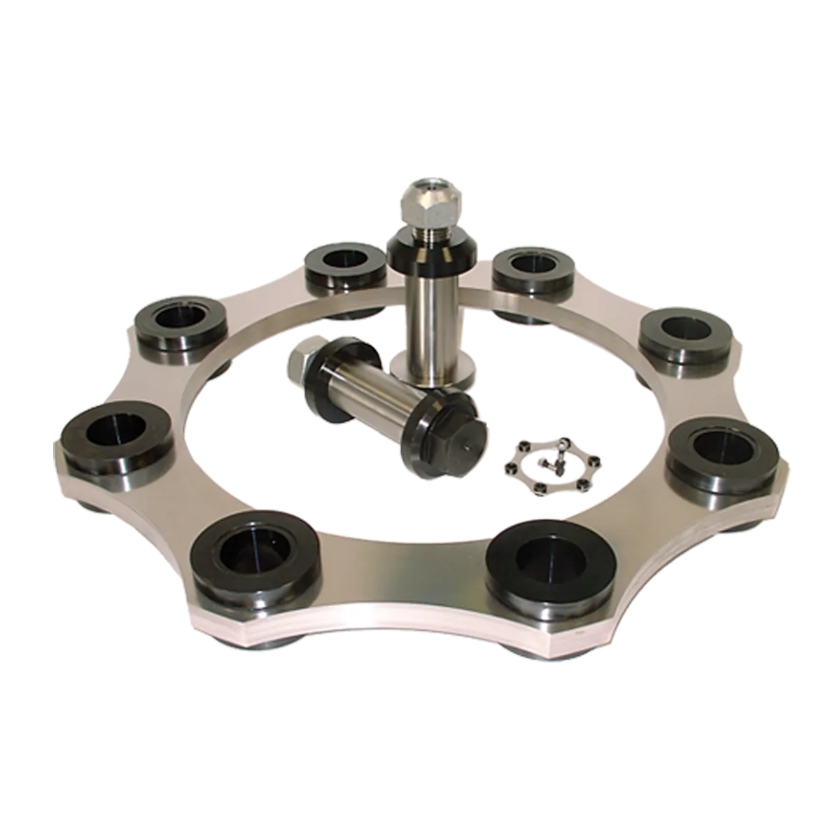 Rundes Metallteil mit mehreren schwarzen Buchsen und zwei großen Bolzen in der Mitte.