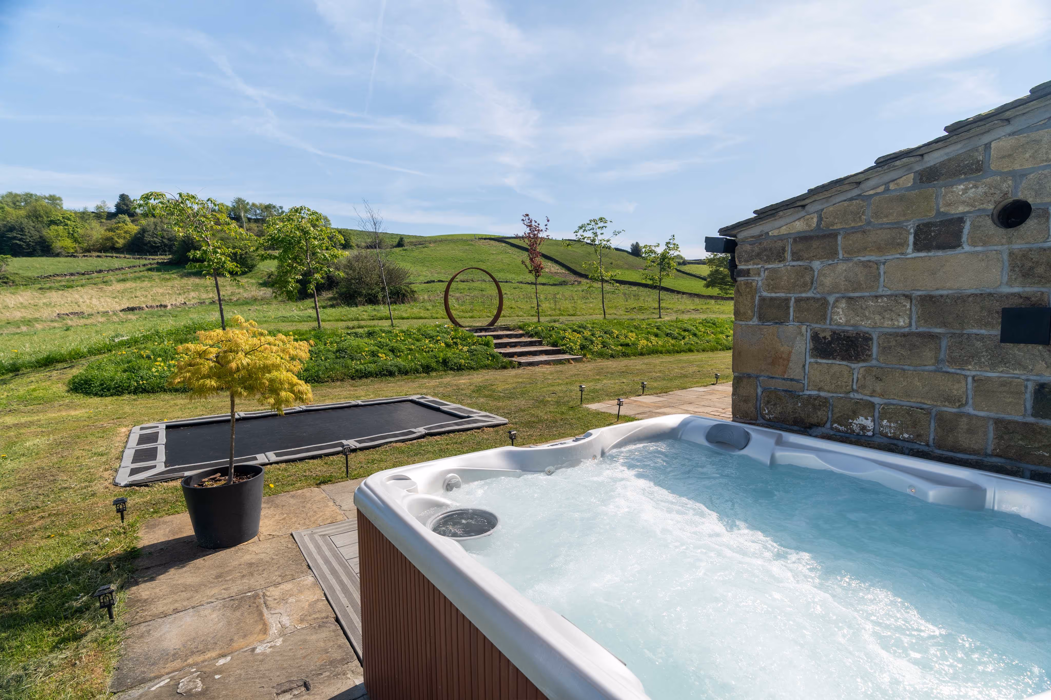 The hot tub bubbling away looking out onto the Yorkshire country side