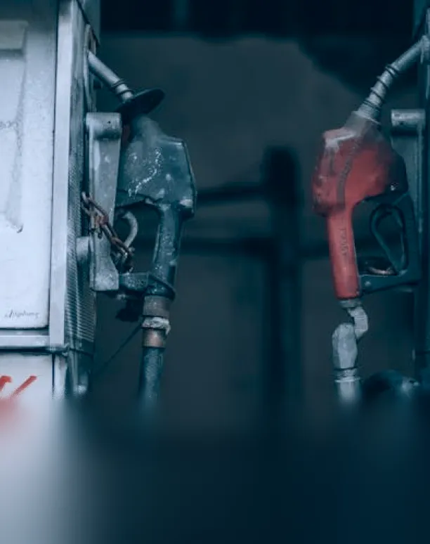 Worn black and red fuel nozzles.