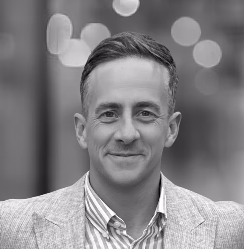 Headshot of Adam Fisk, one of the founding partners