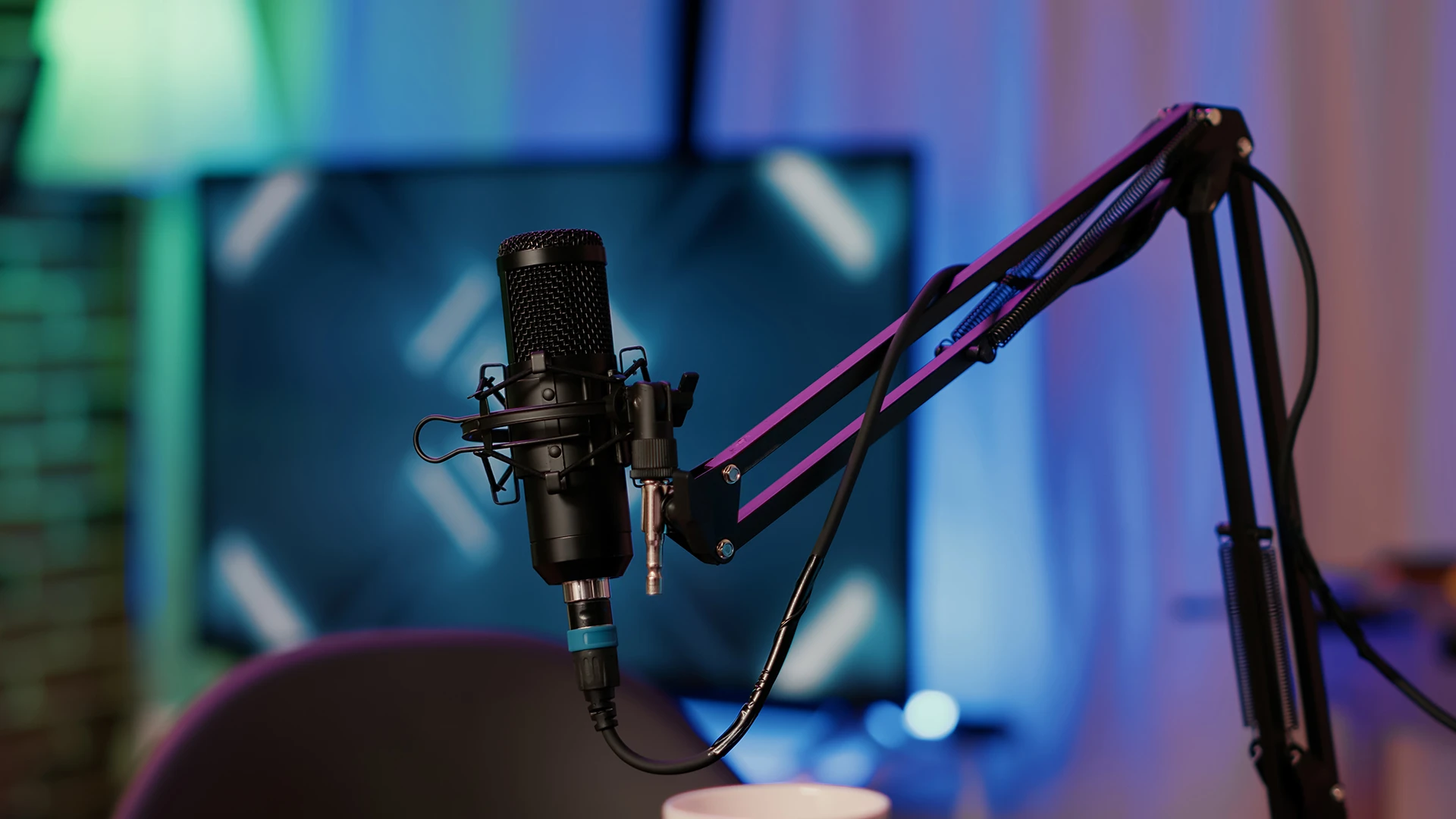 A microphone and a television in a room.