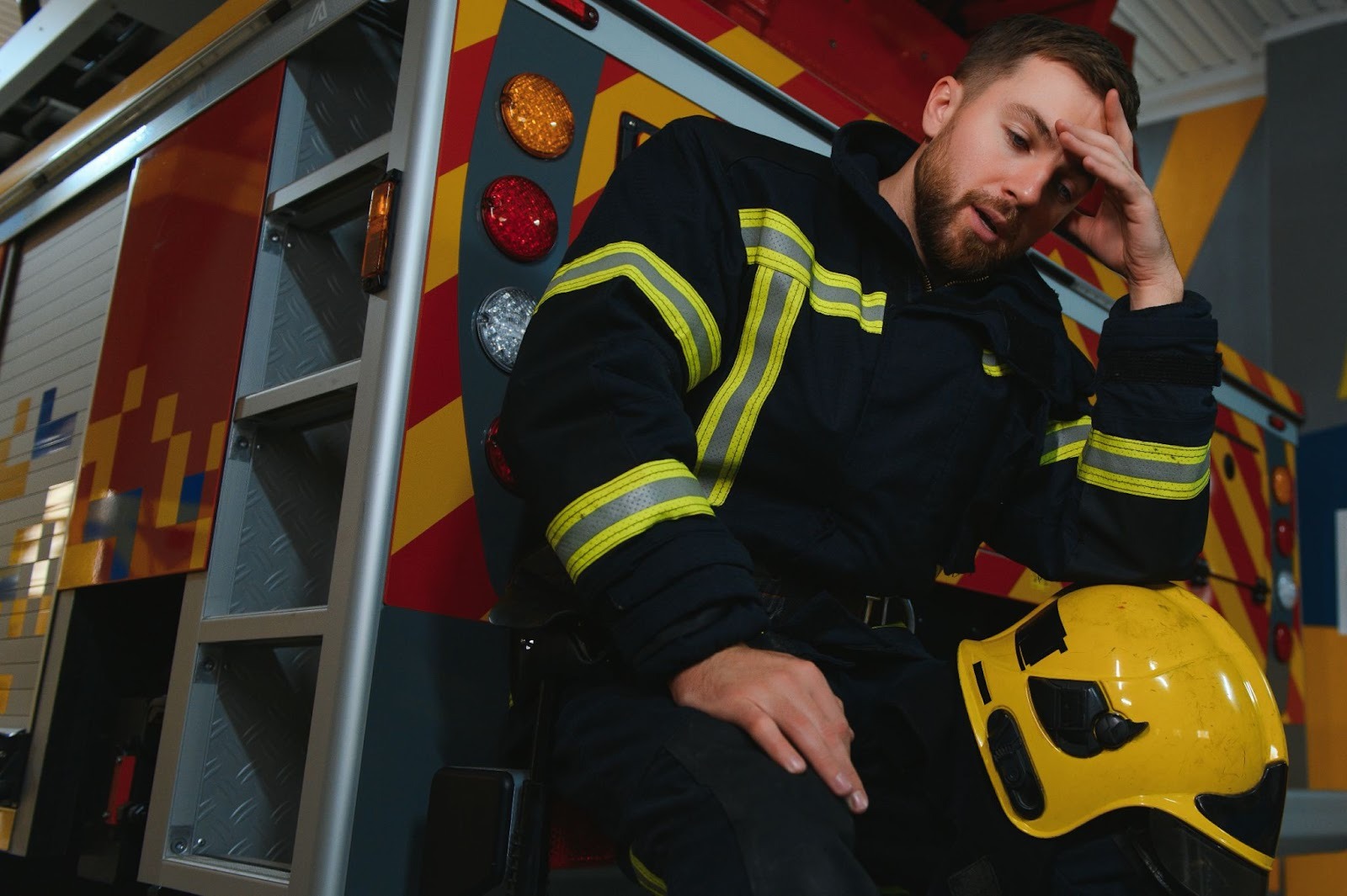 Firefighter experiencing burnout and mental health stress during duty