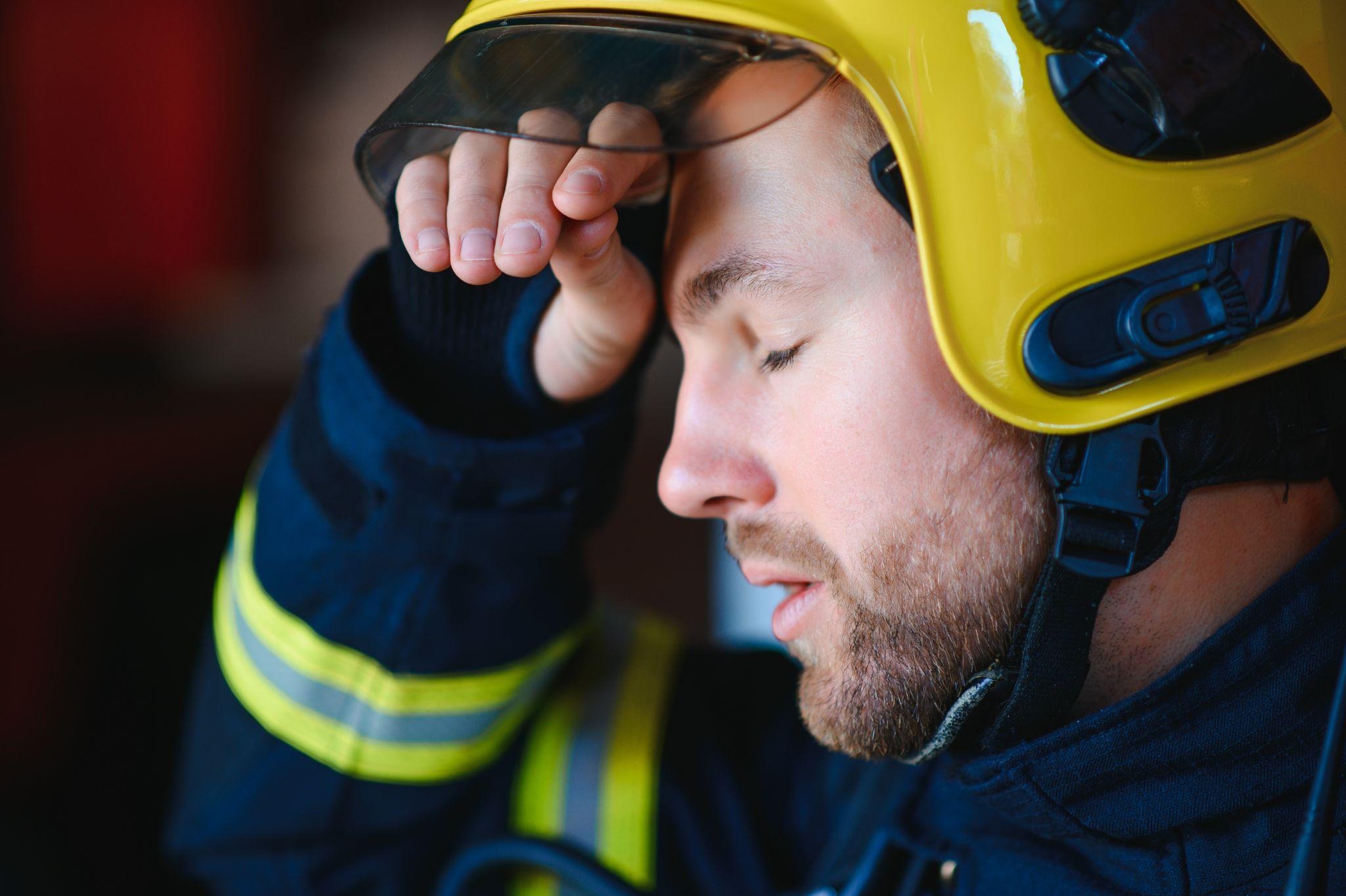 Firefighter experiencing workplace burnout and stress