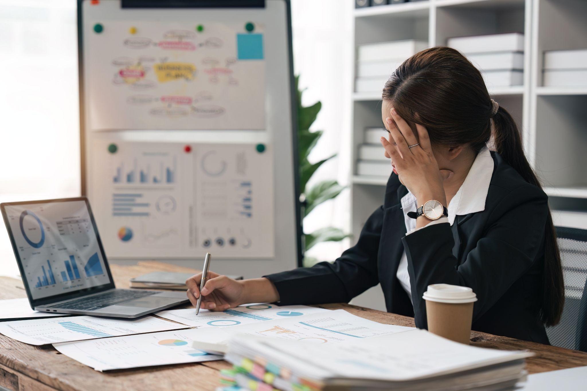 Employee struggling with stress in the workplace