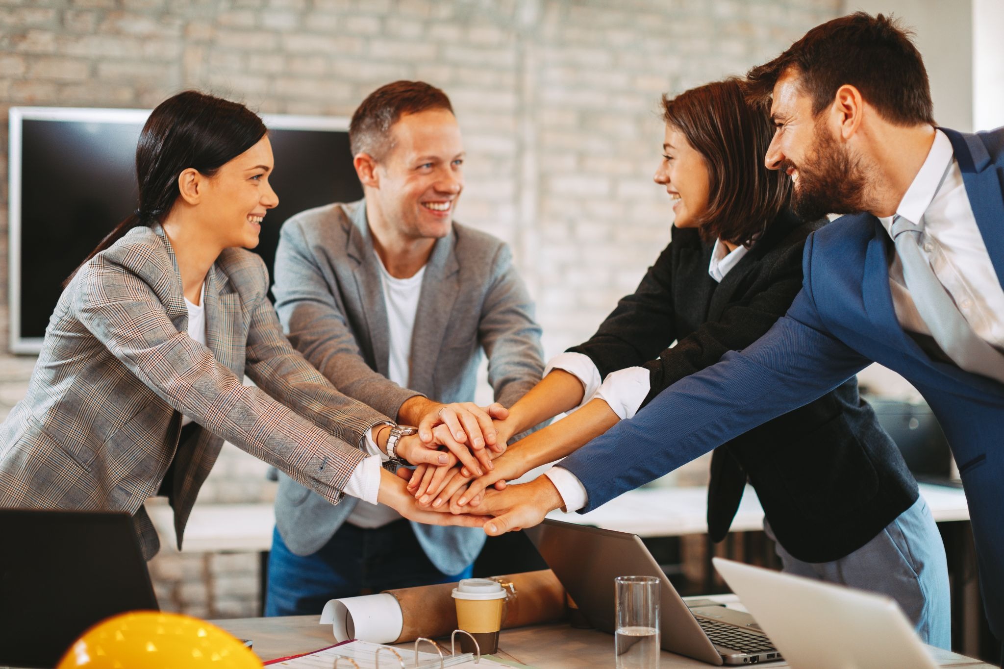 Business team showing collaboration and organizational resilience during a workplace strategy meeting