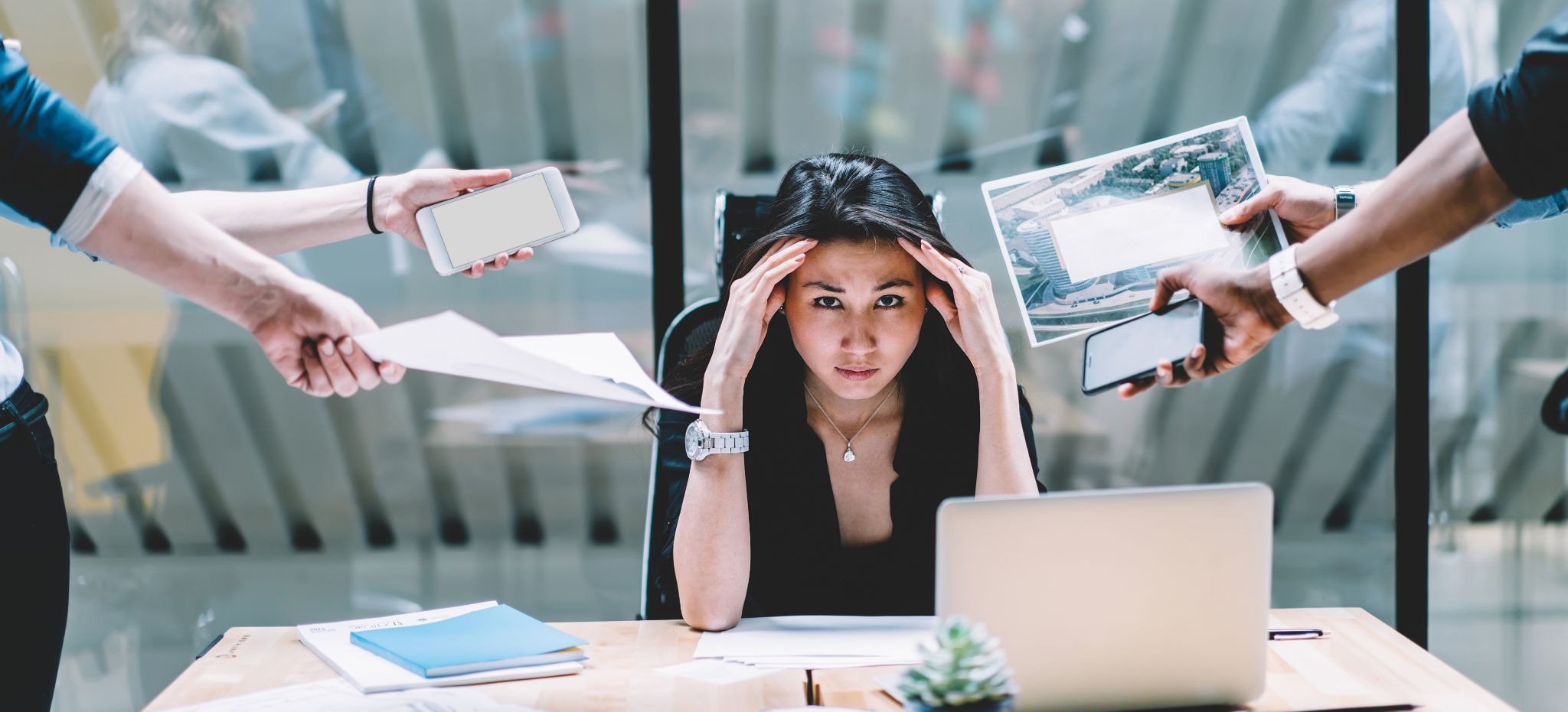 Employee overwhelmed by workplace stress and mental fatigue affecting productivity