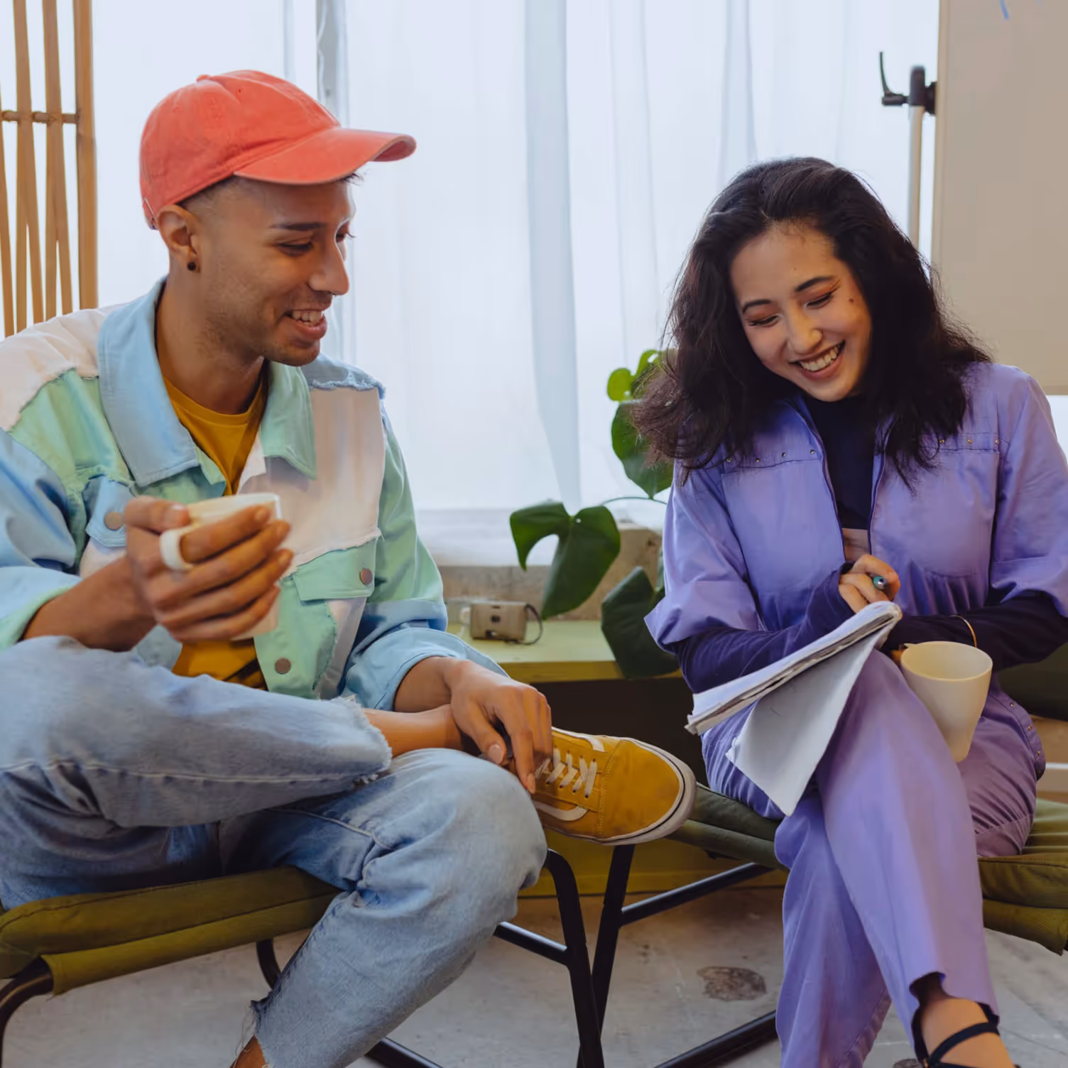 Photo of a lively meeting of two people, they are discussing a topic in a friendly and candid atmosphere.