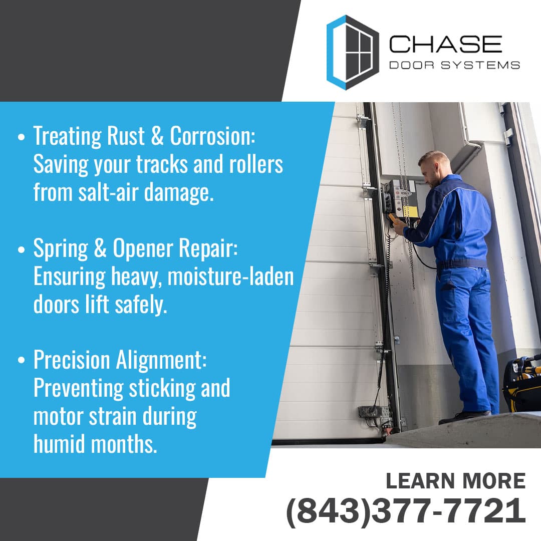 Technician repairing garage door opener and tracks to prevent rust and moisture damage.