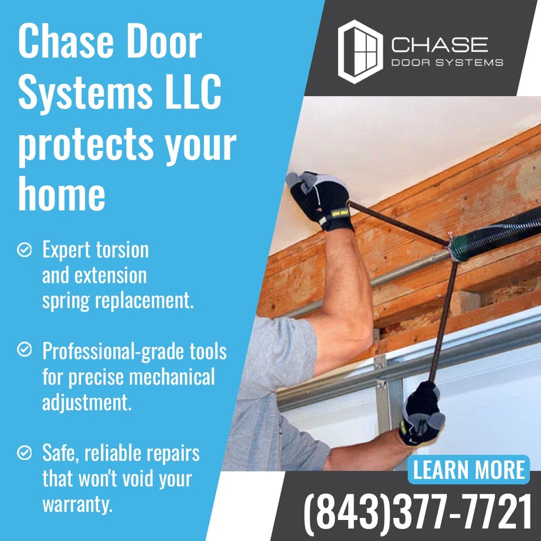 Technician replacing garage door torsion spring using professional tools for safe and precise repair.