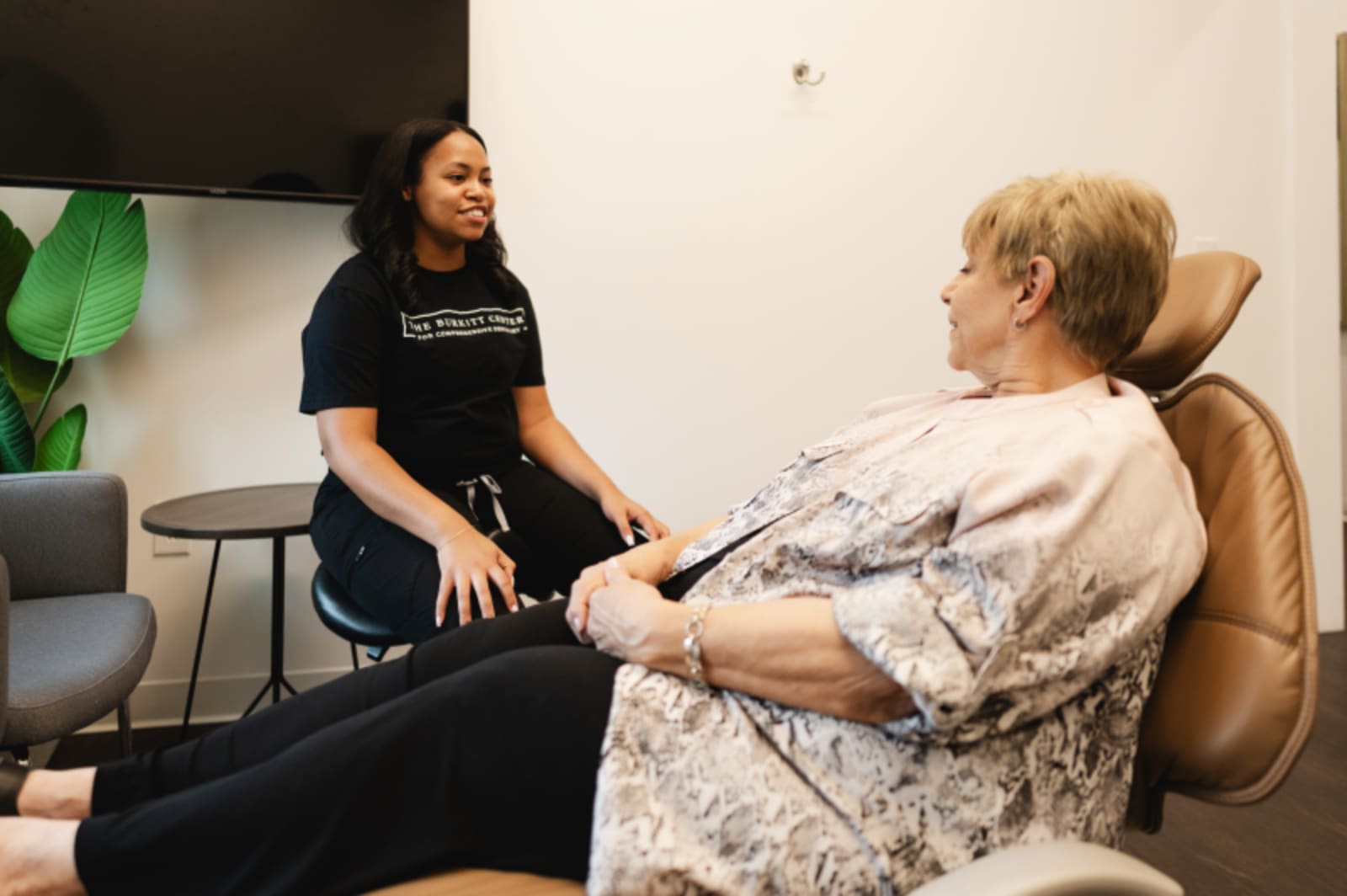 Dentist conducting comprehensive tooth examination and evaluation with patient