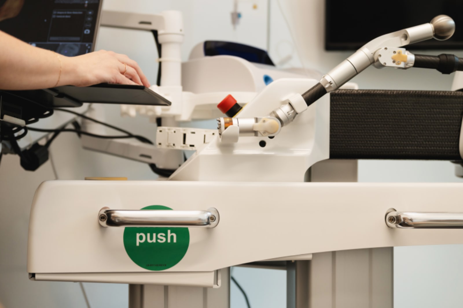 Dental professional holding advanced diagnostic equipment for tooth examination