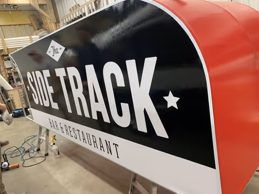 Studio Signs Co. custom Sidetrack sign