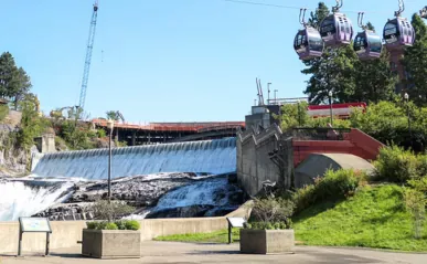 water flowing over a dam