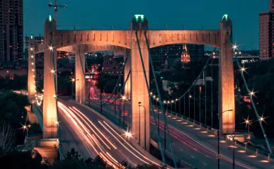 Suspension bridge lit up at night