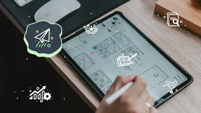 person drawing designs on tablet