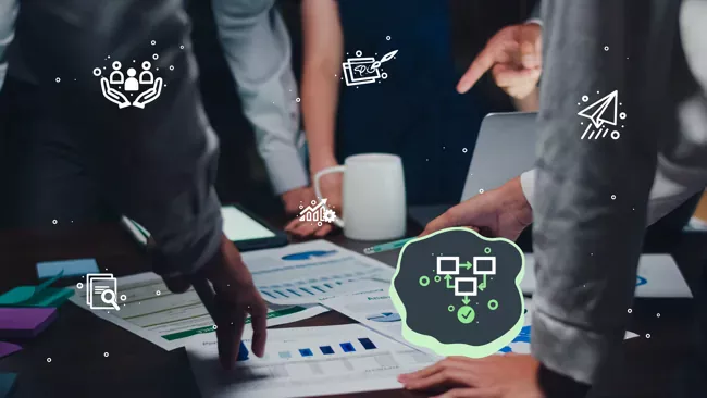 people collaborating around papers with data