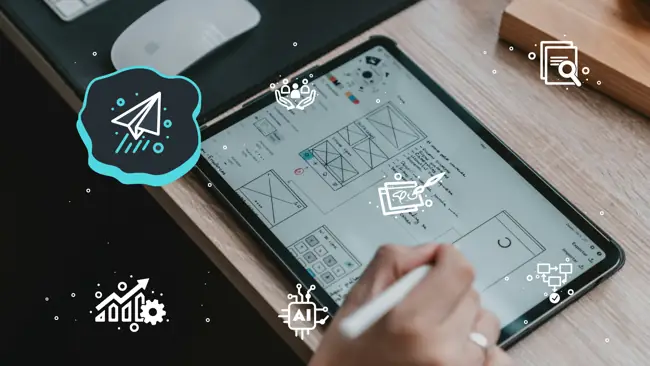 person drawing designs on tablet