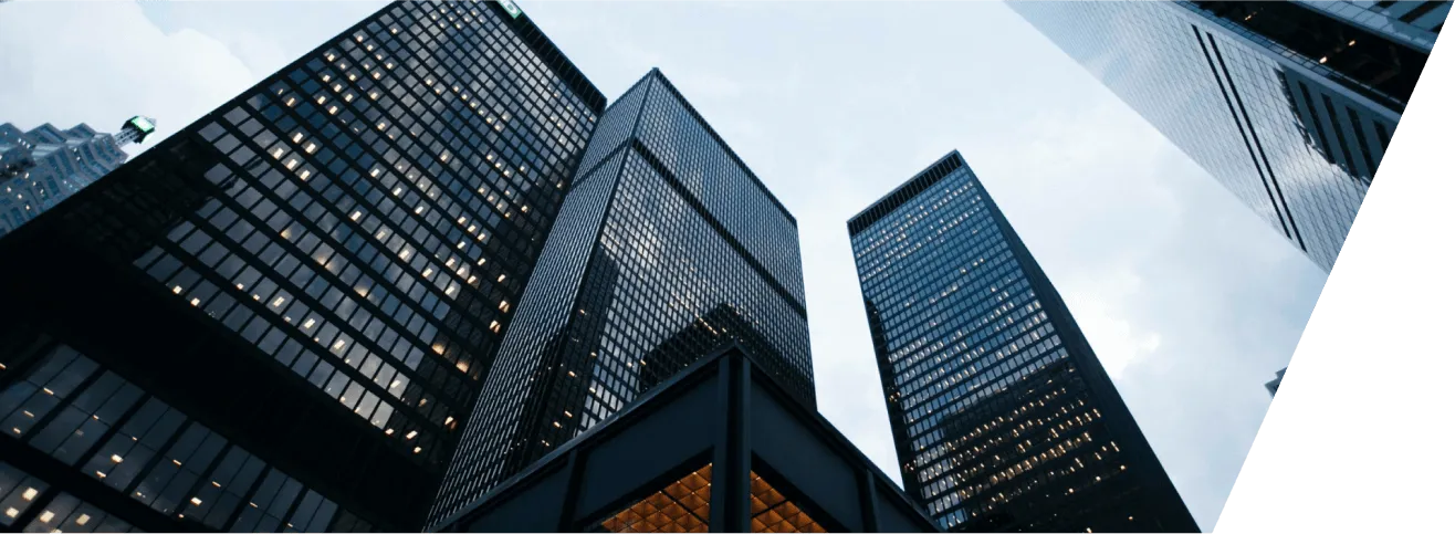 a group of tall buildings towering over a city